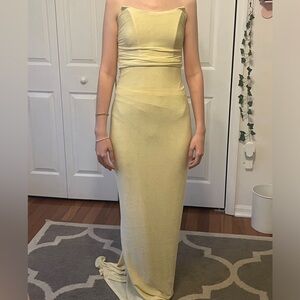 Pale yellow strapless prom dress; criss cross back; small train; new/never worn
